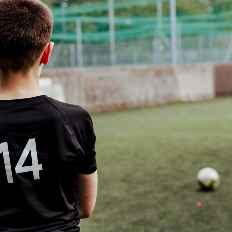 Kids playing football